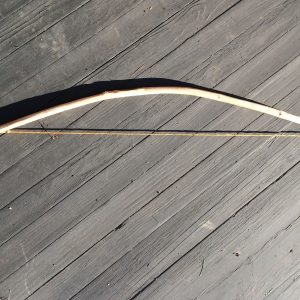 A small bow made from a sapling limb.