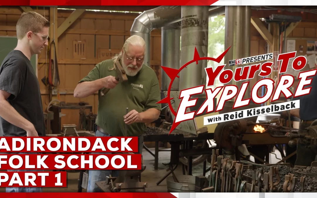 Text reading"WNYT presents Yours to Explore with Reid Kisselback, Adirondack Folk School Part 1". over a background of two men working in a blacksmith's shop.